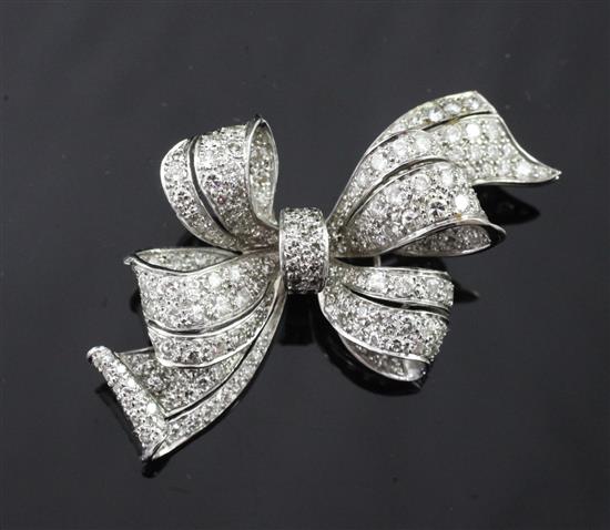 A platinum and diamond ribbon bow brooch, 1.75in.